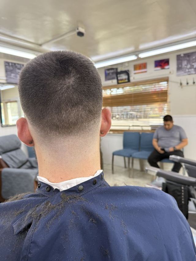 A clean skin fade, seen from the back