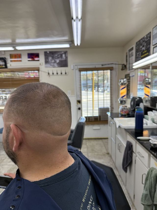 A taper fade finished at the neckline